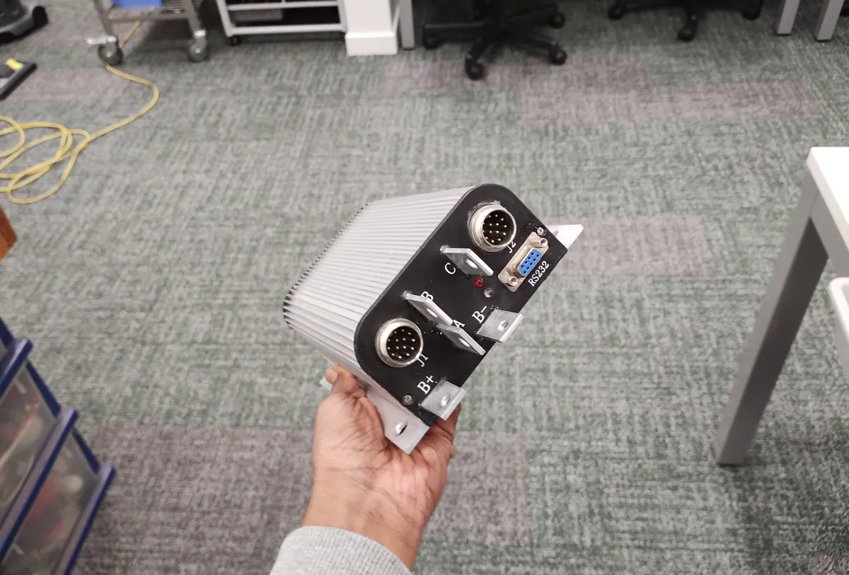 Aluminium motor controller held in one hand