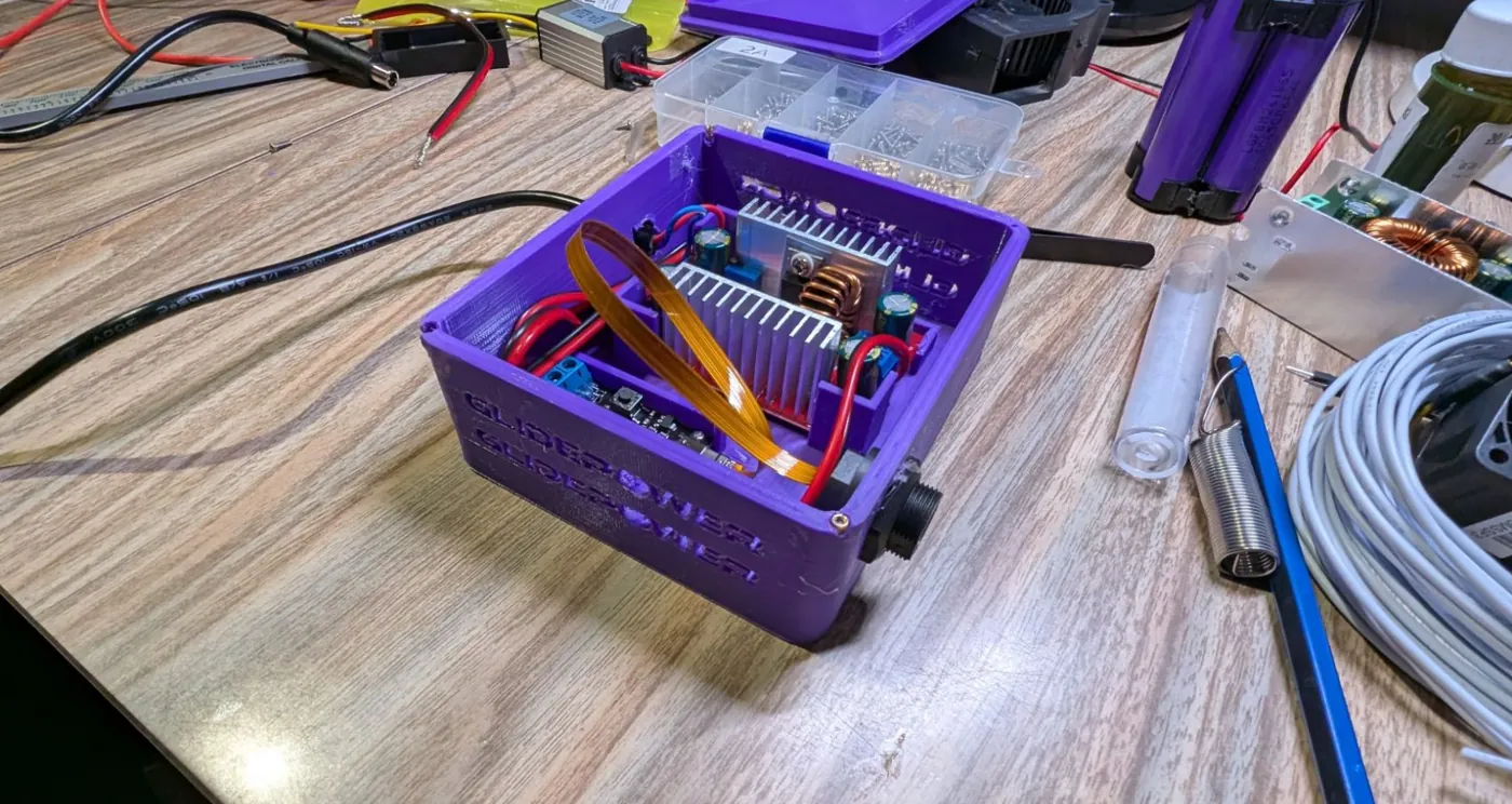 Side of the printed box with GLIDEPOWER cut through the wall in two rows