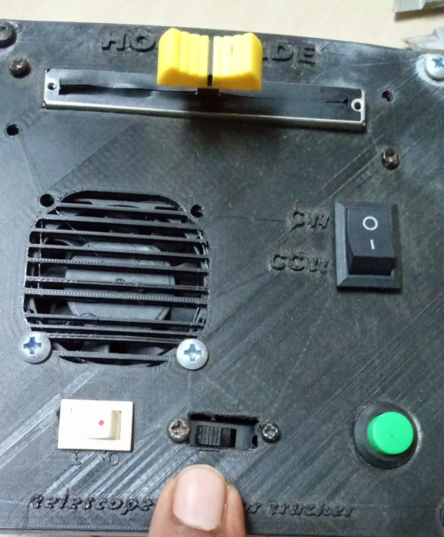 The finished panel: a yellow speed slider, fan grille, CW/CCW rocker, power switch and a green start button