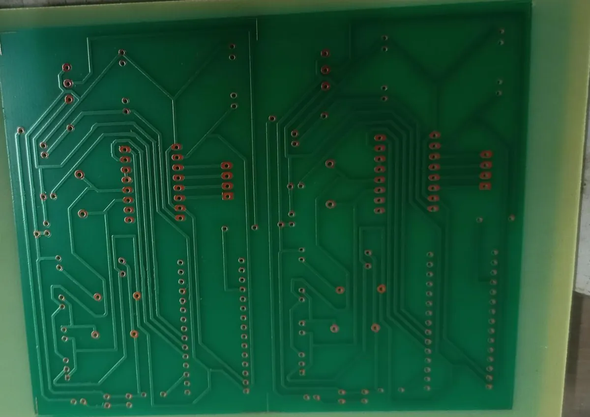 Two copies of the etched board, traces and pads, before drilling