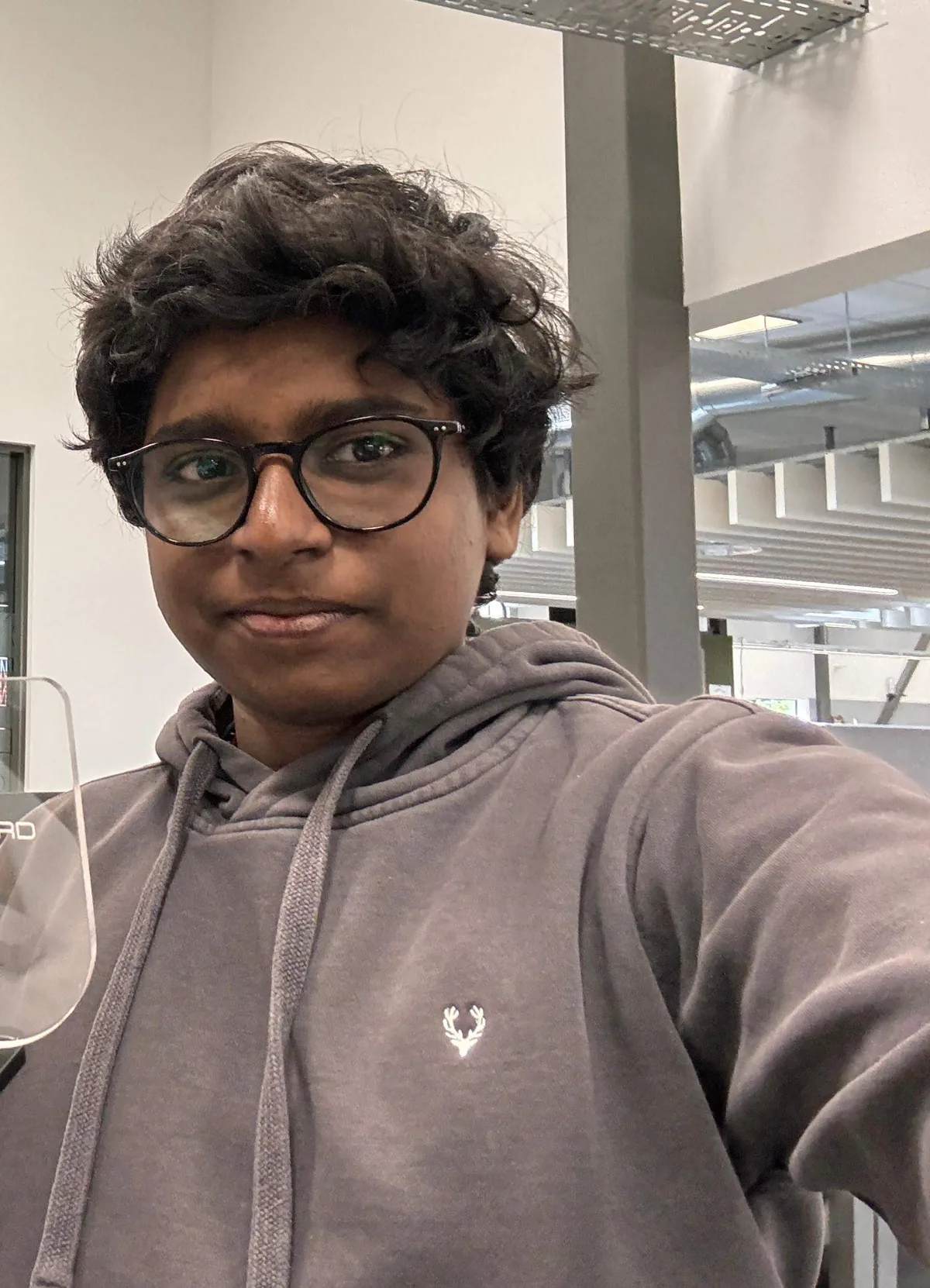 Vishan holding the EVolocity Electronic Innovation Award trophy